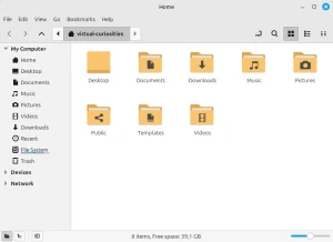 A window titled "Home." The menubar contains File, Edit, View, Go, Bookmarks, Help menus. An address bar with a left arrow, right arrow, and up arrow buttons, next to a set of three buttons, one being a left arrow button, the middle being an icon of a house labelled virtual-curiosities, and the right being a right arrow button. At the right side, five icons whose purpose is difficult to tell: a "return" shaped arrow, a magnifying glass, four squares forming a larger square, 3 squares at left of 3 lines, and 6 small rectangles. On the left pane, a list of locations to navigate: My Computer (expanded) including Home, Desktop ,Documents, Music, Pictures, Videos, Downloads, Recent, File System (with a filling bar under the label), Trash; Devices (collapsed), Network (Collapsed). The main pane has several folder icons, most with a matching icon on the folder: Desktop, Documents (with a paper icon), Downloads (down arrow), Musci (music note), Pictures (camera), Public (3 connected dots), Templates (fading paper icon), Videos (reel). At the bottom, a status bar with 3 buttons at the left, the message "8 items, Free Space: 39,1 GB", and a slider at the right.